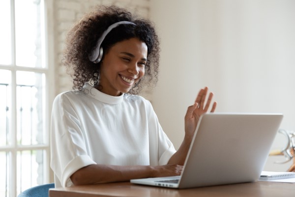 Women video chatting on computer