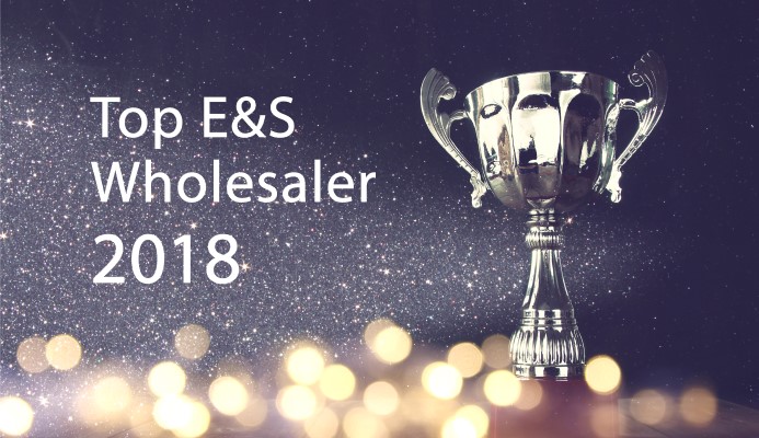 Top E&S Wholesaler award with trophy