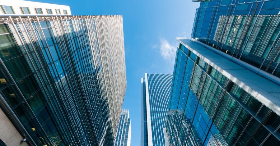 Looking up at skyscrapers