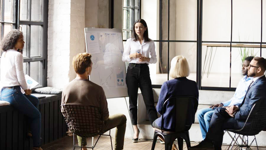 Business women giving presentation